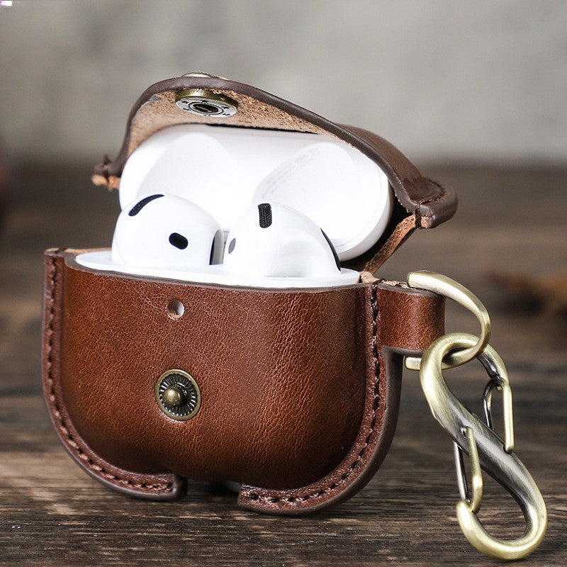 Applicable to the new airpods4 cowhide earphone cover, snap buckle all-inclusive anti-drop Apple 4th generation Bluetooth earphone cover.