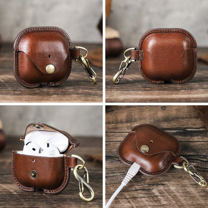 Applicable to the new airpods4 cowhide earphone cover, snap buckle all-inclusive anti-drop Apple 4th generation Bluetooth earphone cover.
